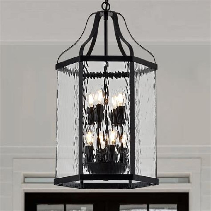 Lantern hanging below iron bars