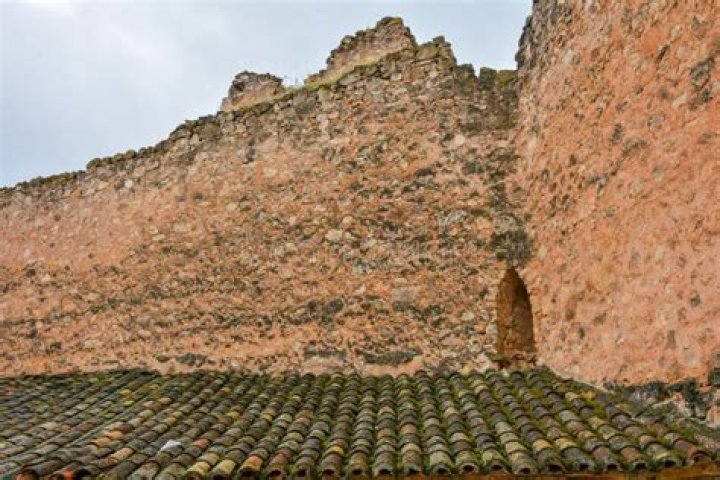 Protecting walled villages with large water sections