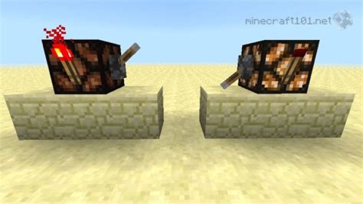 Redstone torch next to powered rail