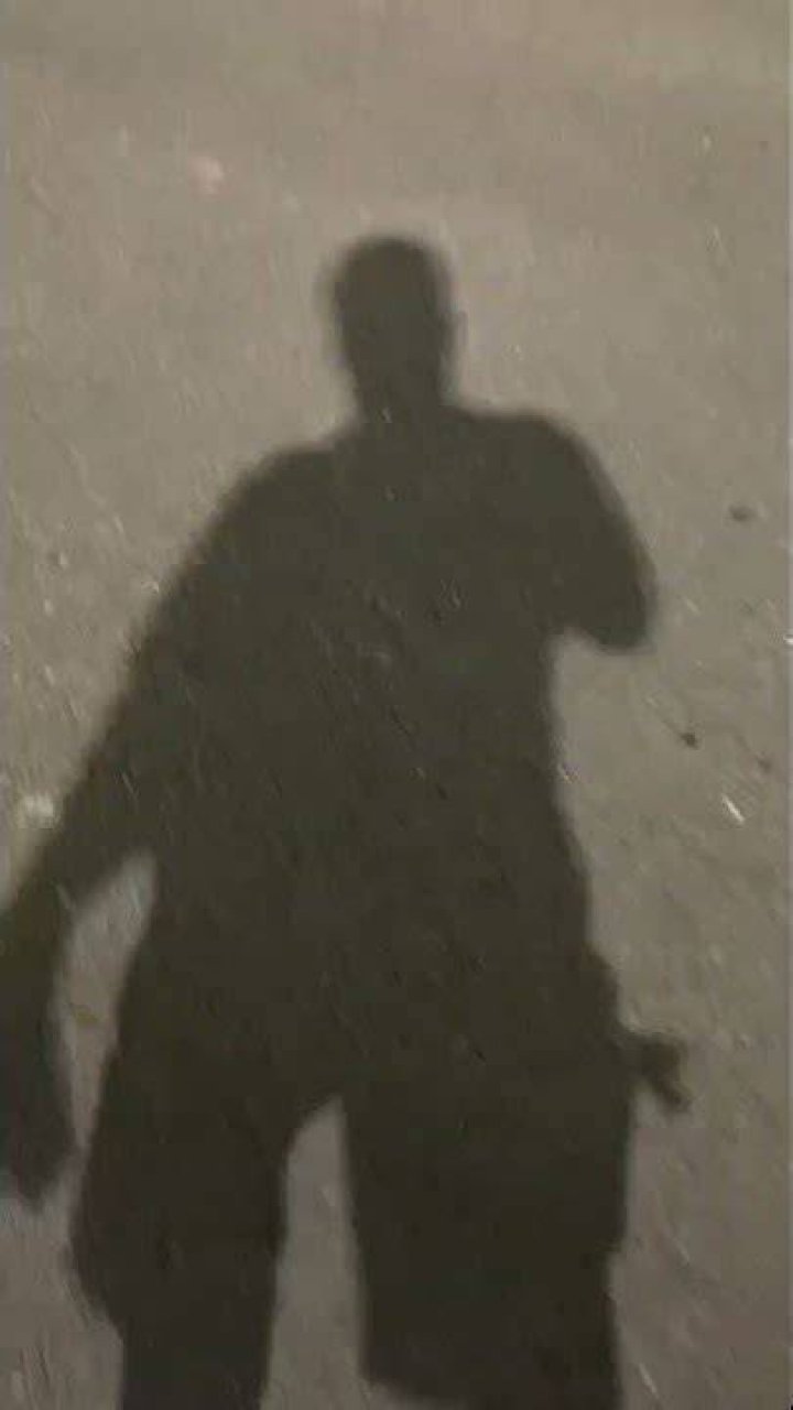 Who is this shadowy figure?
