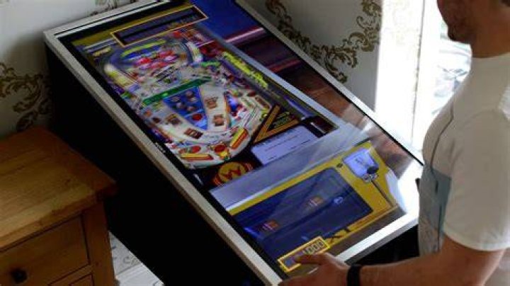 Why do pinball machines/games have a nudge/shake/bump feature?